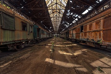 Image showing Cargo trains in old train depot