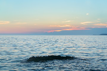 Image showing Beach with rocks and a cloudy sky