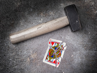 Image showing Hammer with a broken card, jack of hearts