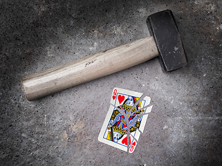 Image showing Hammer with a broken card, queen of hearts
