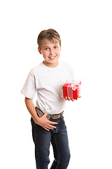Image showing Child holding Christmas gift