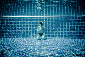 Image showing Man praying under water pool