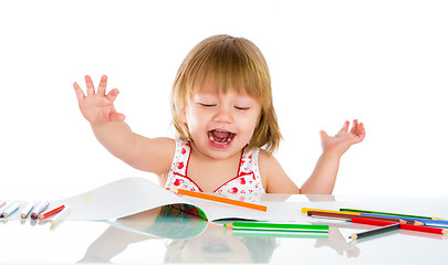 Image showing Little baby girl draws pencil