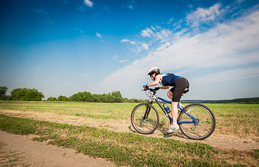 Image showing Women on bike