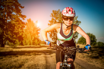 Image showing Women on bike