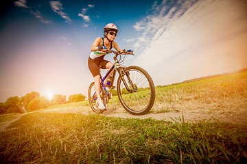 Image showing Women on bike