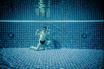 Image showing Underwater pool portraying Superman