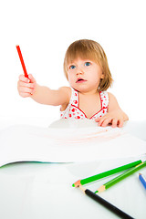 Image showing Little baby girl draws pencil