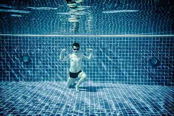 Image showing Underwater pool portraying Superman