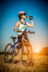 Image showing Women on bike