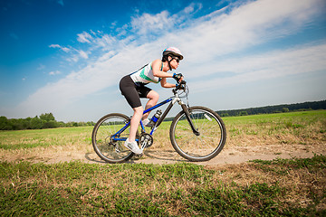 Image showing Women on bike