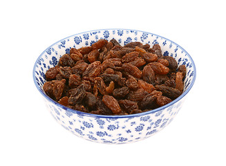 Image showing Sultanas in a blue and white china bowl