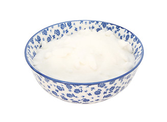 Image showing White caster sugar in a blue and white china bowl