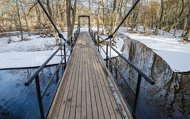 Image showing Bridge across the canal in the spring