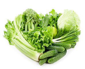 Image showing fresh green vegetables isolated on white 