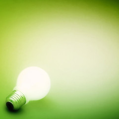 Image showing Background with lit lightbulb