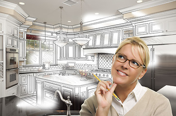 Image showing Woman With Pencil Over Custom Kitchen Design Drawing and Photo