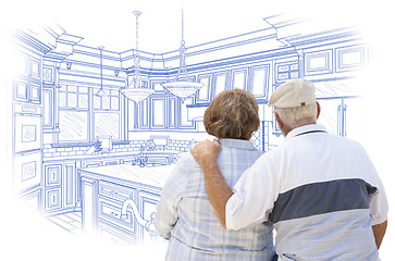 Image showing Senior Couple Looking Over Blue Custom Kitchen Design Drawing