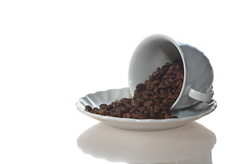 Image showing Coffee cup full of coffee beans