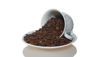 Image showing Coffee cup full of coffee beans