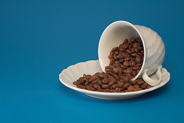 Image showing Coffee cup full of coffee beans