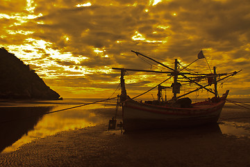 Image showing boat on the beach and sunset 