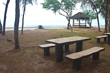 Image showing stone  bench with sea background