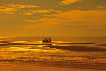 Image showing boat on the beach and sunset 