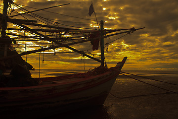 Image showing boat on the beach and sunset 