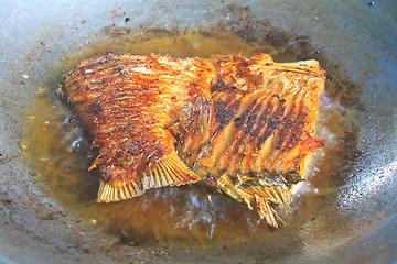 Image showing Fried fish in a frying pan