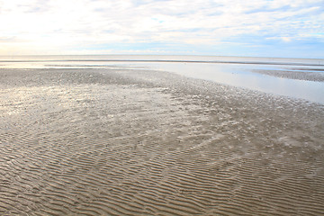 Image showing Beach sand waves warm texture 