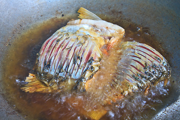 Image showing Fried fish in a frying pan