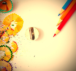Image showing varicolored pencil, shavings and sharpener