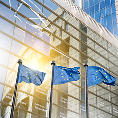 Image showing European union flag against parliament in Brussels