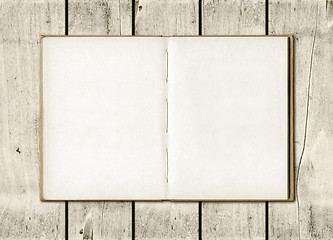 Image showing Note book on a white wood background