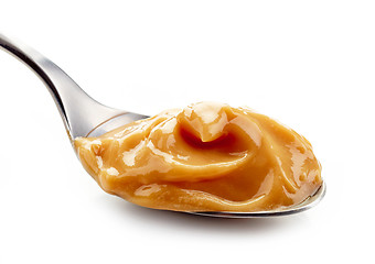 Image showing caramel pudding in a spoon