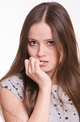 Image showing Portrait of beautiful girl with hand near face