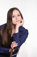 Image showing Dynamic portrait of girl on a chair