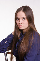 Image showing Portrait of girl in a blue blouse