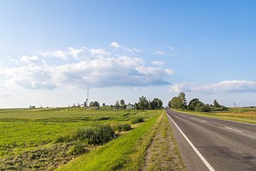 Image showing Road through fields downcountry in summer 