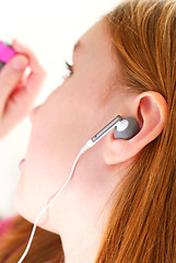 Image showing Girl listen music