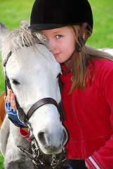 Image showing Girl and pony