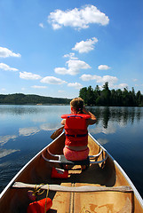 Image showing Child in canoe