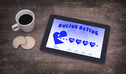 Image showing Online dating on a tablet