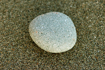 Image showing Stone in sand