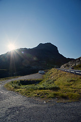 Image showing Sun shining on the road through mountain plateau Valdresflye, Jo