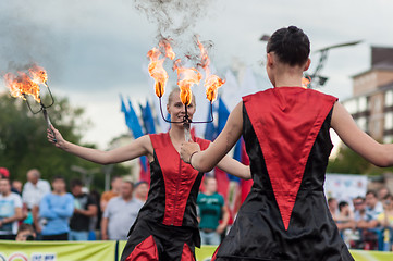 Image showing The girls performed a dance with burning torches