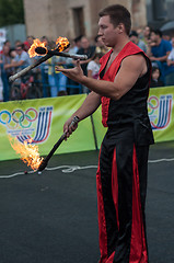 Image showing Juggling flaming batons