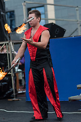 Image showing Juggling flaming batons