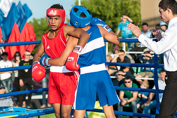 Image showing A boxing match Javier Ibanez, Cuba and Malik Bajtleuov, Russia. Defeated Javier Ibanez